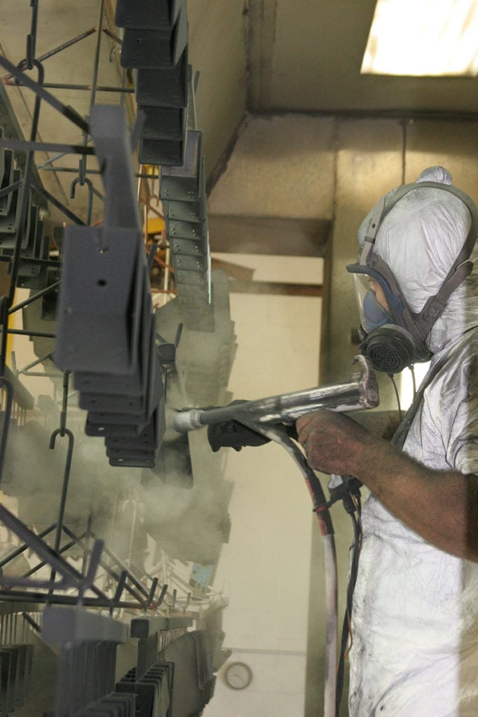 technician spraying product