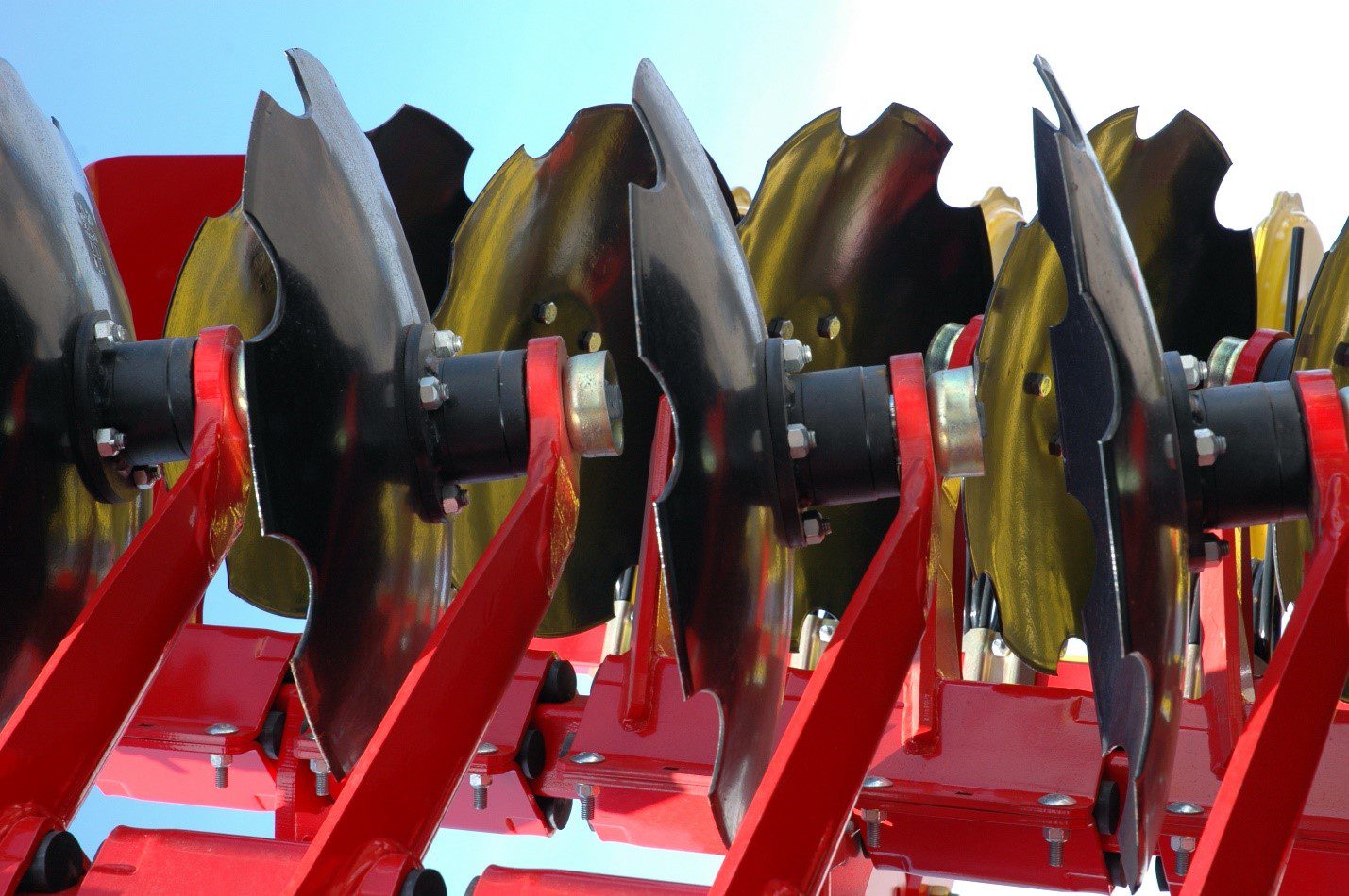 Farm equipment coated for protection with powder coating