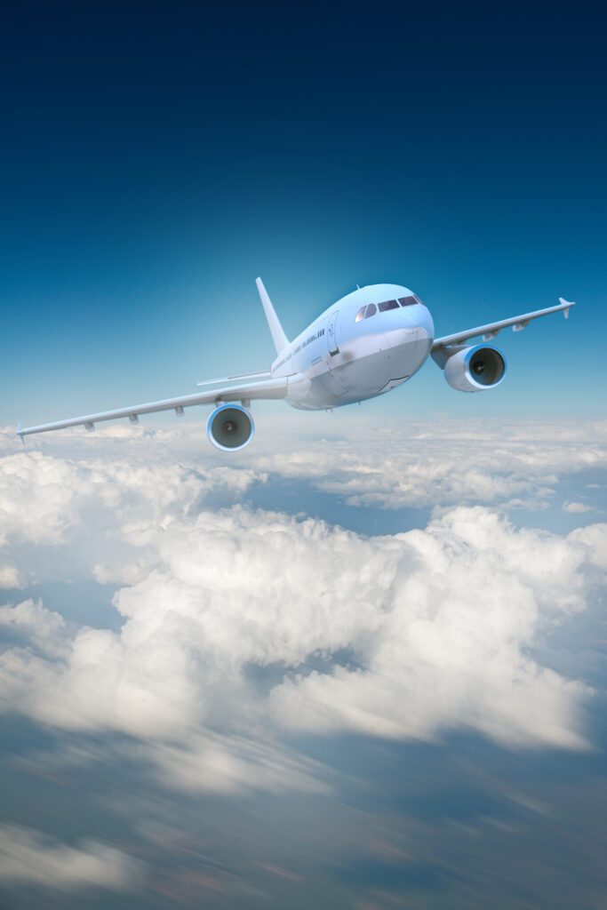 A plane flying above the clouds